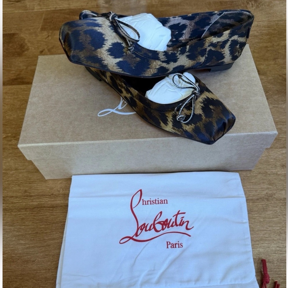 Christian Louboutin Animal Print Flats with Iconic Red Soles
